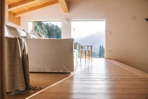 Un pat sau paturi într-o cameră la Der Jägersberg