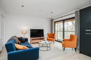 Posezení v ubytování The Wee Abode