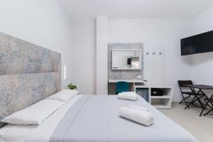 Letto o letti in una camera di Hotel da Ettore - Salento Selection