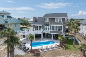 an aerial view of a house with a swimming pool at One Particular Harbor - Harbor Island Oceanfront, Private Pool! in Cedar Reef Villas
