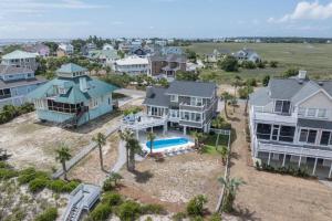 an aerial view of a house with a pool at One Particular Harbor - Harbor Island Oceanfront, Private Pool! in Cedar Reef Villas