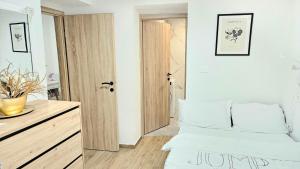 Postel nebo postele na pokoji v ubytování Center Koper apartment by Istrian apartments Koper