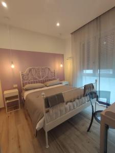 Postel nebo postele na pokoji v ubytování Da Filippo B&B