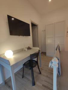 TV a/nebo společenská místnost v ubytování Da Filippo B&B