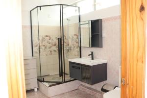 Ванна кімната в Sunset view Suite