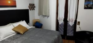 A bed or beds in a room at BB dalla zia