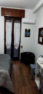 A bed or beds in a room at BB dalla zia