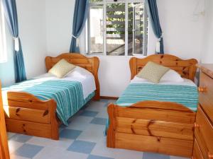 Ліжко або ліжка в номері Sunset view Suite