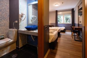 Koupelna v ubytování Scheppers Hotel