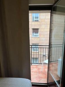 Un balcón o terraza de Roomin Hostel