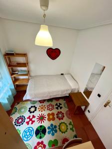 Cama o camas de una habitación en Roomin Hostel