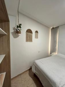 Cama o camas de una habitación en Roomin Hostel