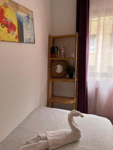 Cama o camas de una habitación en Roomin Hostel