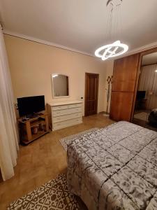 TV o dispositivi per l'intrattenimento presso Casa Luciana - Comfort a Lucca con Parcheggio