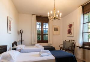 En eller flere senge i et værelse på El Mirador Esencia Mediterránea + 57 billeder