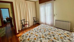 Posteľ alebo postele v izbe v ubytovaní VACACIONES VILLASANA