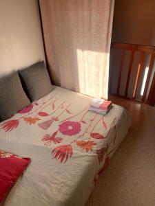 Ένα ή περισσότερα κρεβάτια σε δωμάτιο στο Ma jolie petite maison de la plage