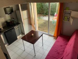 Η κουζίνα ή μικρή κουζίνα στο Ma jolie petite maison de la plage +5 φωτογραφίες