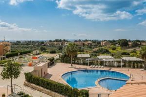 an image of a swimming pool at a resort at Residence Club el Paraiso 37 in Sa Ràpita