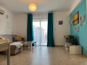 Гостиная зона в AFRODITI APARTMENTs