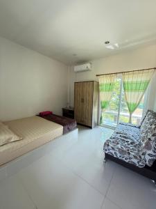 Χώρος καθιστικού στο PhaluaiHomestay พะลวยโฮมสเตย์