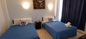 Cama ou camas em um quarto em Hotel Coral