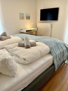 Postel nebo postele na pokoji v ubytování bloom - Zentral, modern, großzügig für 1-6 Pers