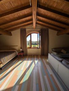 Postel nebo postele na pokoji v ubytování Casale Elisa Country Hotel + 37 fotografií