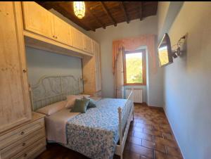 Postel nebo postele na pokoji v ubytování House Piccola Tivoli