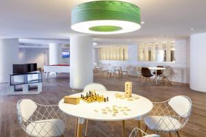 Телевизор и/или развлекательный центр в Tigotan Lovers & Friends Playa de las Americas - Adults Only (+18)