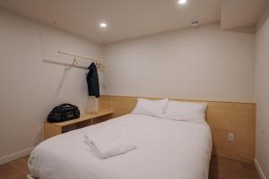 Cama o camas de una habitación en Chalets OST Shefford FORFAIT GROUPE