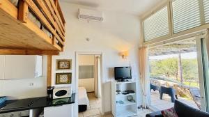 Et tv og/eller underholdning på Appartement Libeccio 22 LUMIO