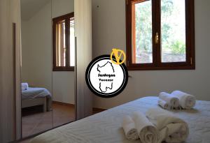 Postel nebo postele na pokoji v ubytování Casa Nonno Gino 2