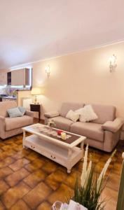 Posezení v ubytování House Piccola Tivoli