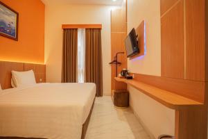 Μια τηλεόραση ή/και κέντρο ψυχαγωγίας στο The Cabin Hotel Lovina Bali
