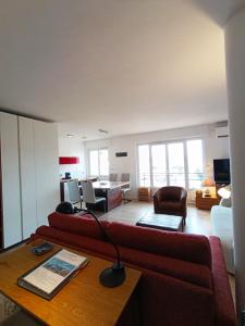 TV a/nebo společenská místnost v ubytování Plages du Midi, Superbe Vue Mer, Grand Confort, 4 pers