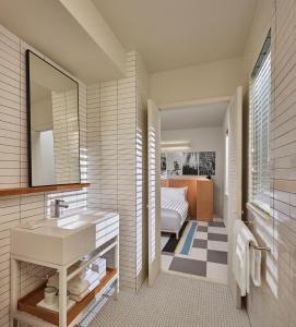 Ένα ή περισσότερα κρεβάτια σε δωμάτιο στο The Asbury Hotel
