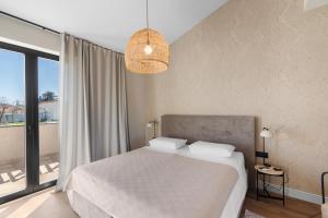 En eller flere senge i et værelse på Villa Maria + 23 billeder