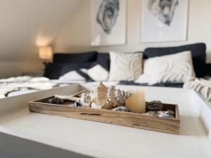 Posteľ alebo postele v izbe v ubytovaní Lazy Osyter Sylt