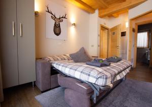 Ένα ή περισσότερα κρεβάτια σε δωμάτιο στο Chalet Sant' Antoni Bondi