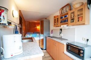 Kuchyň nebo kuchyňský kout v ubytování Ferienhaus in Kurort Oberwiesenthal mit Grill