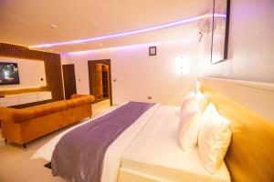 Voodi või voodid majutusasutuse Db Continental Loft Apartment toas