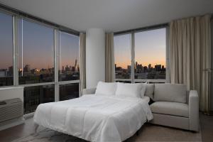 Ultra Luxury Apt - Panoramic NYC View with Pool - Minutes to City客房内的一张或多张床位