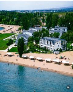 an aerial view of a beach and buildings at Harmony Lake House in Chon-Sary-Oy