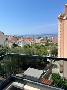 a view of a city from a balcony at Villa Sandra Promajna in Promajna