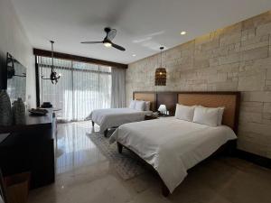 Postel nebo postele na pokoji v ubytování Hotel Mundo Maya Calakmul