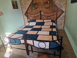 A bed or beds in a room at Stanza Del Viggiatore