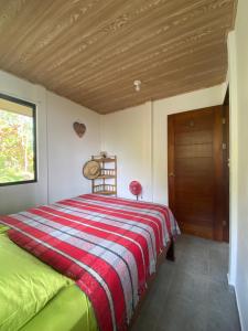 Ένα ή περισσότερα κρεβάτια σε δωμάτιο στο Casa Veronica