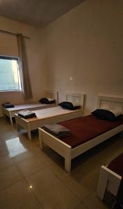 Postel nebo postele na pokoji v ubytování Paradiso Hostel