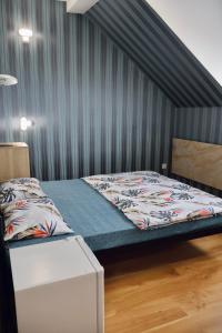 Postel nebo postele na pokoji v ubytování VIP hotel